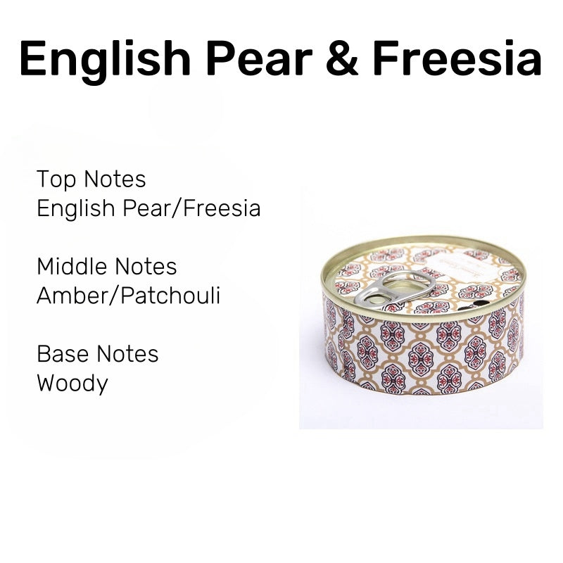 On the Go Traveling Tin Can Scented Candle in English Pear & Freesia fragrance, with delicate pear, freesia, amber, and woody notes