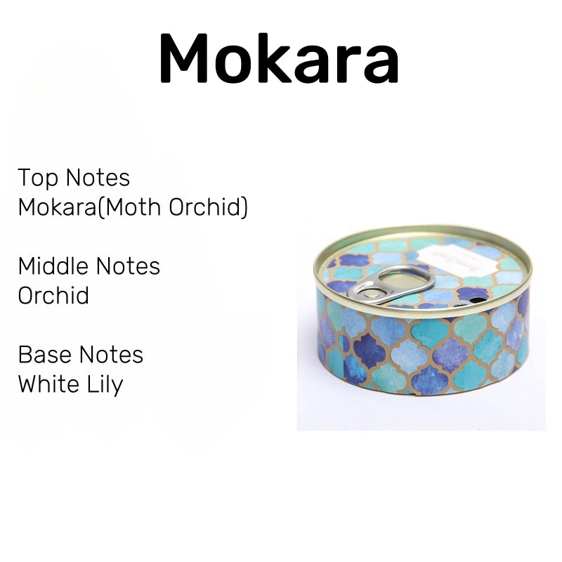 On the Go Traveling Tin Can Scented Candle in Mokara fragrance, offering a serene blend of orchid, jasmine, and lily for a sweet, calming scent.