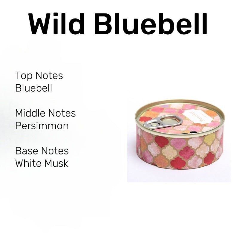 On the Go Traveling Tin Can Scented Candle in Wild Bluebell fragrance, a fresh, floral scent of bluebell, persimmon, and soft musk.